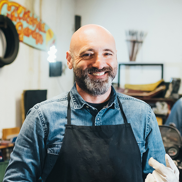 portrait of mature man in garage RDPVWQD